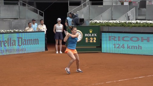 Two handed backhand follow through