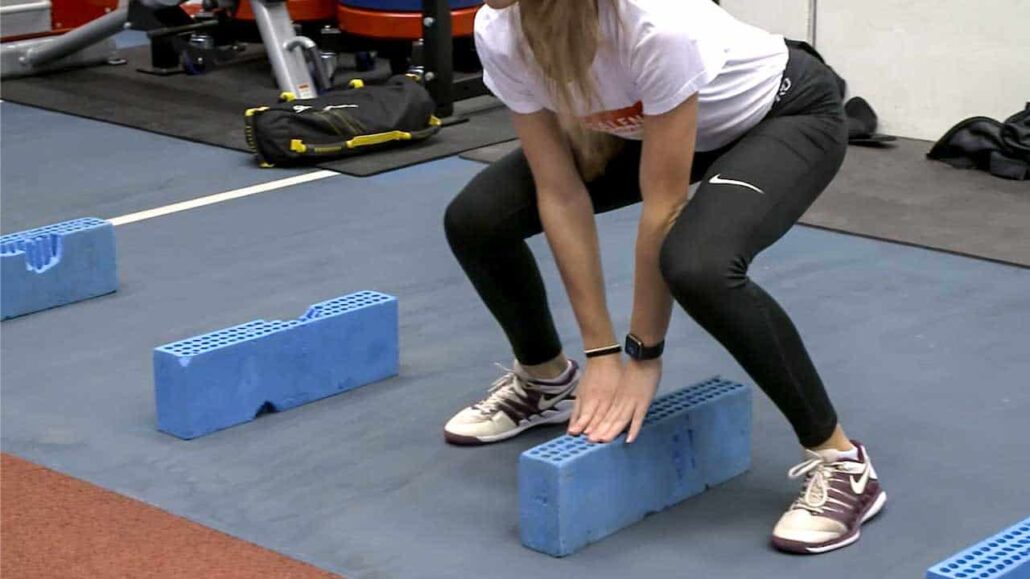 Frog jumps over foam obstacles