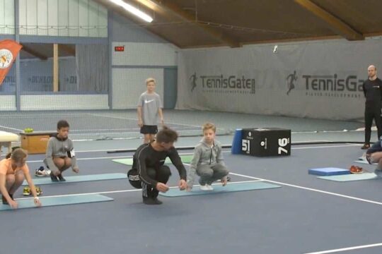 Kids testing knee bend with closed feet