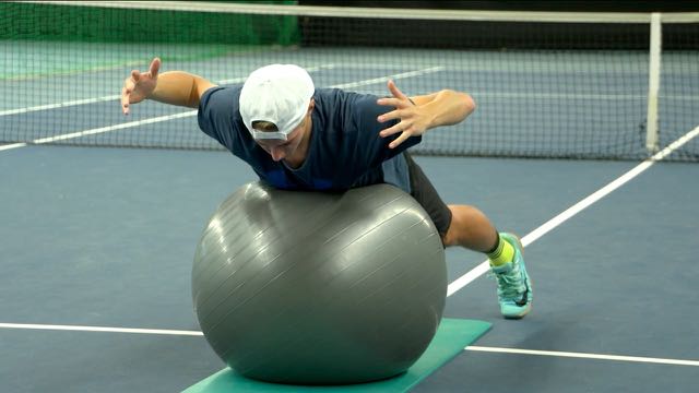 Strength – Upper Back Work Lying on a Swiss Ball