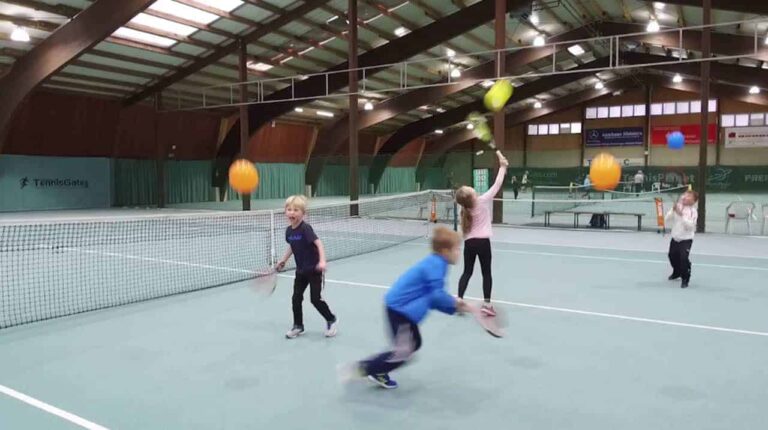 Keeping the balloon in the air with a racquet